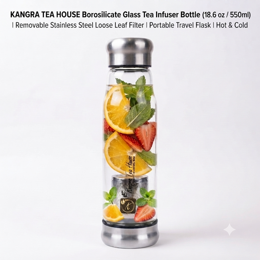 A KANGRA TEA HOUSE borosilicate glass tea infuser bottle with a stainless steel lid and base, shown filled with orange slices, strawberries, and mint leaves. Text at the top describes the product features.